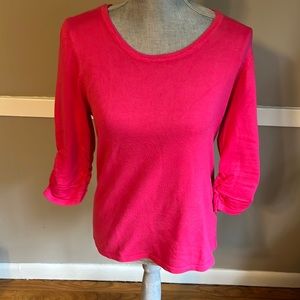 Pink sweater. With scrunch on sleeves.